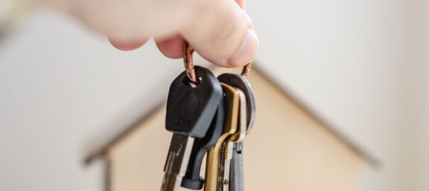person with keys for real estate